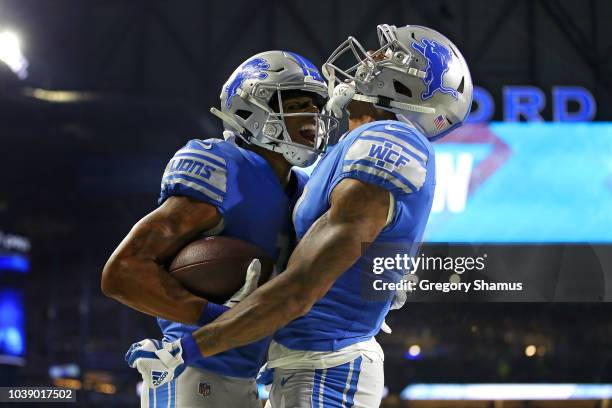 Marvin Jones of the Detroit Lions celebrates his third quarter touchdown with Kenny Golladay while playing the New England Patriots at Ford Field on...