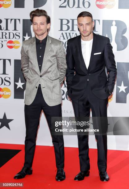 Louis Tomlinson and Liam Payne arrive at the BRIT Awards at The O2 Arena in London, England, on 24 February 2016. Photo: Hubert Boesl -...