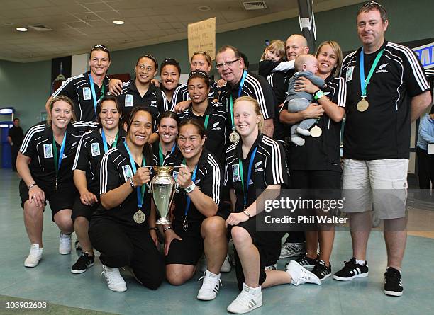 The New Zealand Black Ferns pose for a team photo as the team arrive at Auckland Airport after the Women's Rugby World Cup on September 8, 2010 in...