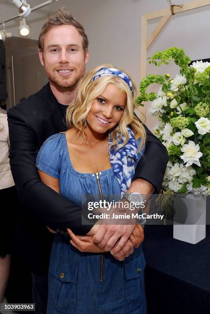 Eric Johnson and Jessica Simpson attend a launch event and press preview for the Spring 2011 Jessica Simpson Collection "Show Me Your Blues"...