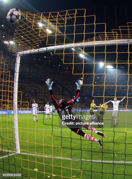 Madrid's goalkeeper Diego Lopez can n ot save the ball for the 3-1 during the UEFA Champions League semi final first leg soccer match between...