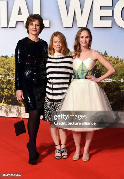 Actors Martina Gedeck , Karoline Schuch and Inez Bjorg David arrive for the world premier of the film 'Ich bin dann mal weg' at Cinestar cinema in...