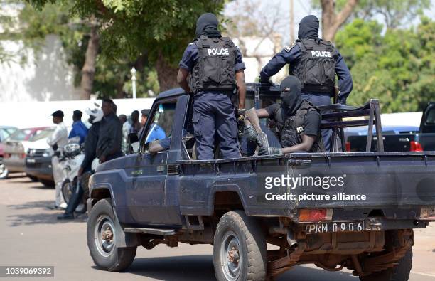 Malian police officers stand outside of the Presidential Palace in Bamako, Mali, 06 February 2014. One day after the German cabinet decided to expand...