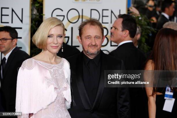 Actress Cate Blanchett and her husband Andrew Upton arrive for the 73rd Annual Golden Globe Awards at the Beverly Hilton Hotel in Beverly Hills,...
