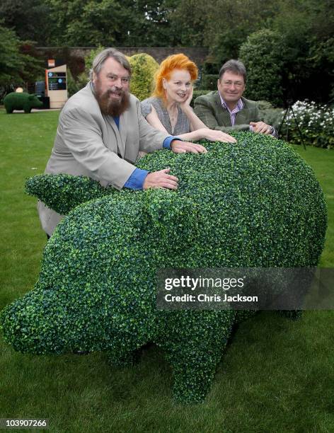 Brian Blessed, Dame Vivianne Westwood and Alan Titchmarsh pose behind the B&Q 'Green Piggy Bank' at the launch of The Prince of Wales' a Garden Party...