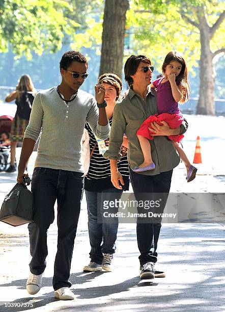 Connor Cruise, Isabella Cruise, Tom Cruise and Suri Cruise visit a Central Park West playground on September 7, 2010 in New York City.