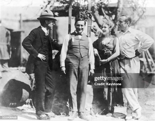 English comic actor Charlie Chaplin , director Ernst Lubitsch , actress Mary Pickford and actor Douglas Fairbanks Sr , USA, circa 1917.