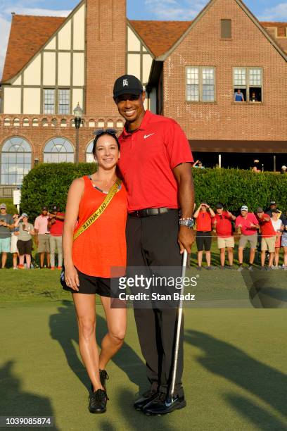 Tiger Woods, winner of the TOUR Championship with his girlfriend, Erica Herman after the final round of the TOUR Championship at East Lake Golf Club...