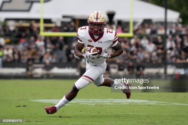 Boston College Eagles running back Travis Levy turns upfield after making a catch during the college football game between the Purdue Boilermakers...