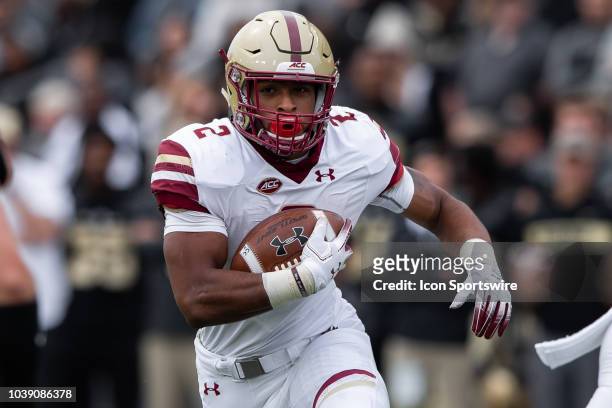 Boston College Eagles running back AJ Dillon runs to the outside during the college football game between the Purdue Boilermakers and Boston College...