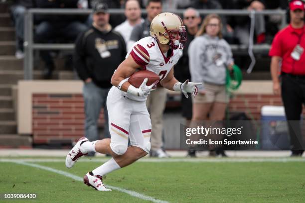 Boston College Eagles wide receiver Michael Walker returns a punt during the college football game between the Purdue Boilermakers and Boston College...