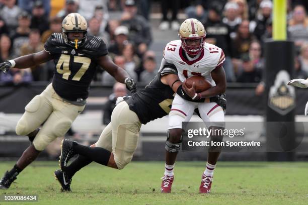 Purdue Boilermakers linebacker Markus Bailey sacks Boston College Eagles quarterback Anthony Brown during the college football game between the...