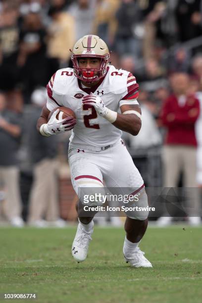 Boston College Eagles running back AJ Dillon runs through a hole to the outside during the college football game between the Purdue Boilermakers and...