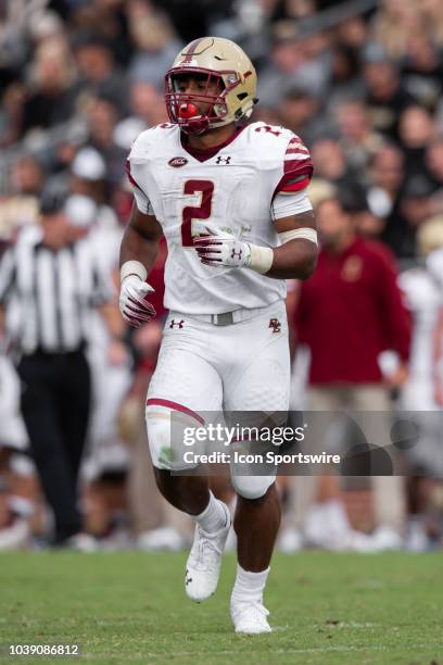 Boston College Eagles running back AJ Dillon runs to the huddle during the college football game between the Purdue Boilermakers and Boston College...