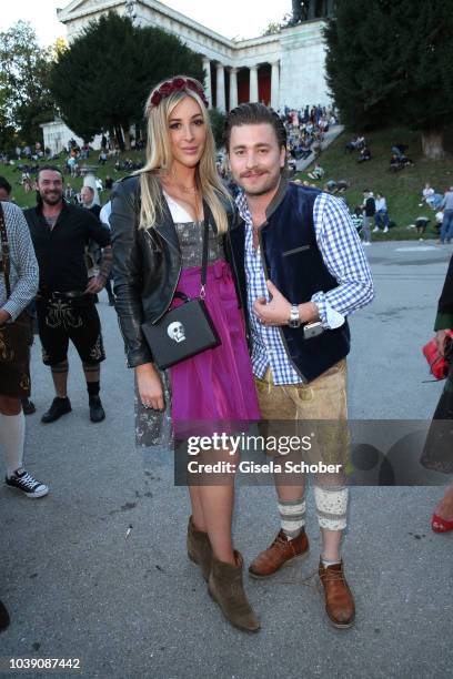 Singer Sebastian Buergin 'Baschi' and his girlfriend Alana Netzer, daughter of Guenter and Elvira Netzer during the Oktoberfest 2018 at...