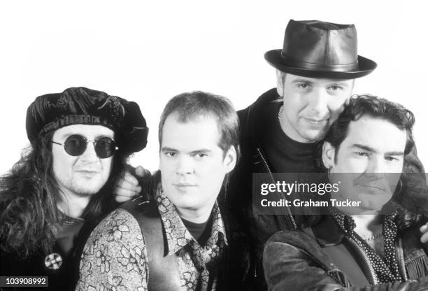 Posed group portrait of The Mission. Left to right are Wayne Hussey, Craig Adams, Mick Brown, Simon Hinkler in 1988.