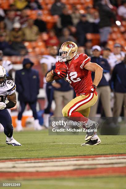 Nate Byham of the San Francisco 49ers making a reception during the game against the San Diego Chargers at Candlestick Park on September 2, 2010 in...