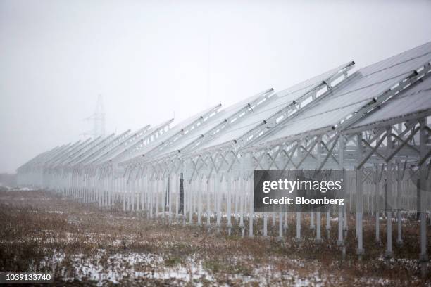 Solar panels stand at the Everyday Farm LLC Monnaran Solar Farm Project, a joint venture between Bridge LLC and Farmdo Co., in Ulaanbaatar, Mongolia,...