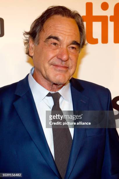 Director Oliver Stone arrives at the premiere of Snowden during the 41st Toronto International Film Festival, TIFF, at Roy Thomson Hall in Toronto,...