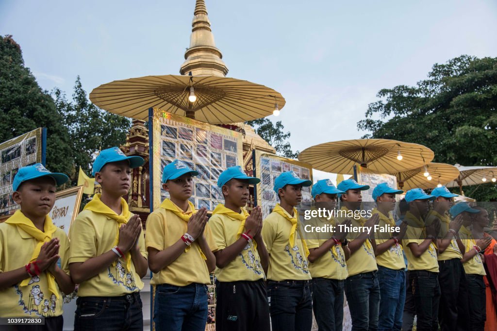 Twelve boys, members of the football team "Wild Boars", aged...