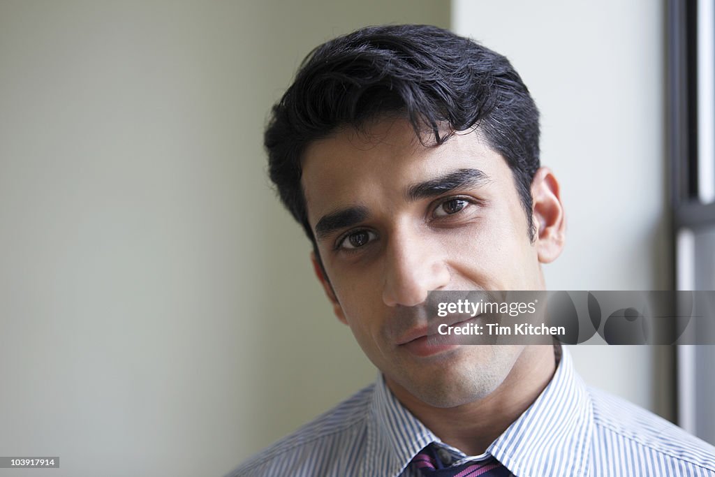 Confident businessman, portrait