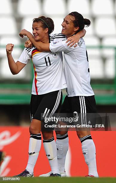 Lena Lotzen of Germany celebrates scoring the first goal with Kyra Malinowski during the FIFA U17 Women's World Cup match between Germany and South...