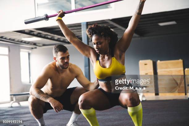 confidence comes from discipline and training - black female bodybuilder stock pictures, royalty-free photos & images