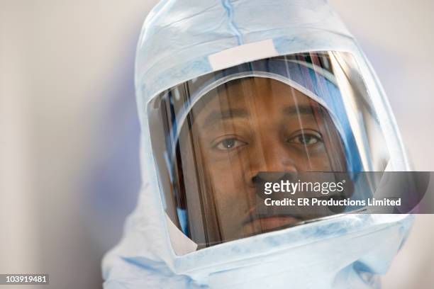 African American doctor in protective suit