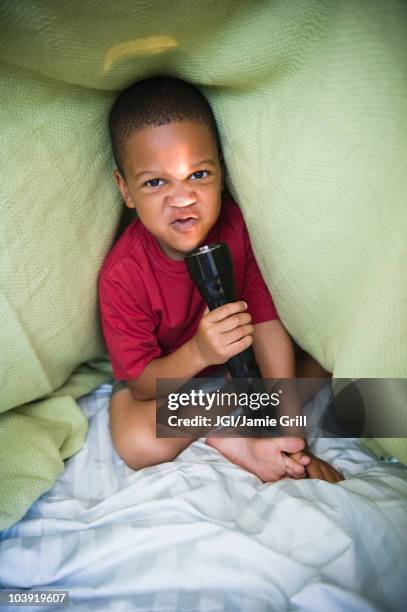 Kid Using Flashlight Photos and Premium High Res Pictures - Getty Images