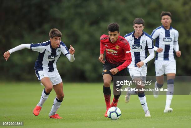 Mason Greenwood of Manchester United U18s in action during the U18 Premier League match between Manchester United U8s and West Bromwich Albion U18s...