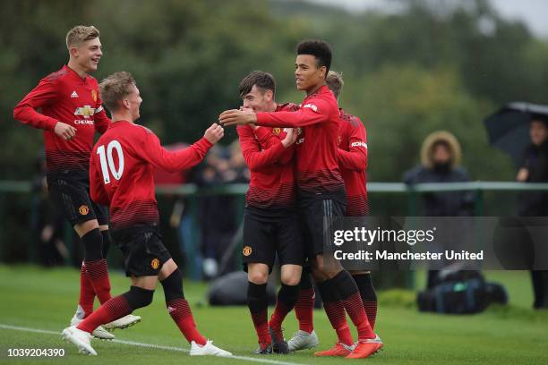 Mason Greenwood of Manchester United U18s celebrates scoring during the U18 Premier League match between Manchester United U8s and West Bromwich...