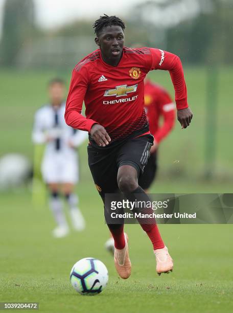 Aliou Traore of Manchester United U18s in action during the U18 Premier League match between Manchester United U8s and West Bromwich Albion U18s on...