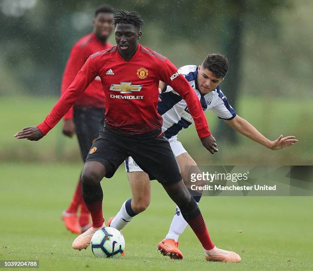 Aliou Traore of Manchester United U18s in action during the U18 Premier League match between Manchester United U8s and West Bromwich Albion U18s on...