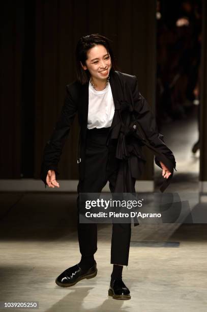 Designer Chika Kisada acknowledges the applause of the audience after her show during Milan Fashion Week Spring/Summer 2019 on September 24, 2018 in...