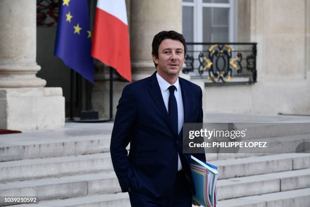 French Government's spokesperson Benjamin Griveaux leaves the Elysee presidential palace in Paris on September 24, 2018 after attending the weekly...