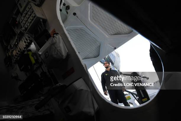 French sailor Louis Burton sails aboard his Imoca 60 monohull Bureau Vallee, as he sails from Lorient to Saint-Malo, on September 24 a few weeks...