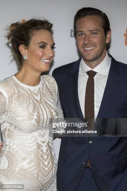 Armie Hammer and wife Elizabeth Chambers attend the premiere of Free Fire during the 41st Toronto International Film Festival, TIFF, at Ryerson...