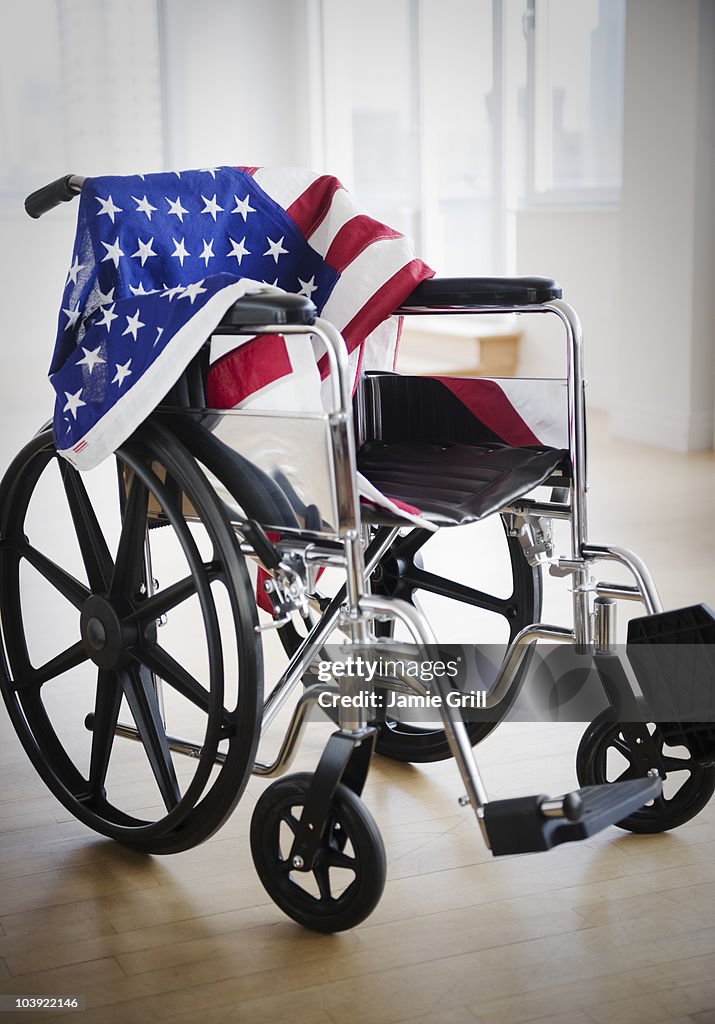American flag draped on wheelchair