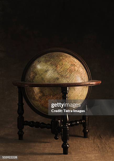 antique globe and stand - desktop globe stock pictures, royalty-free photos & images