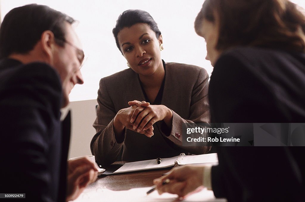 Financial advisor talking to couple