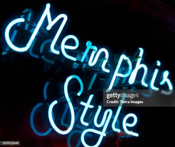 illuminated memphis style sign on beale street in memphis - memphis tennessee stock pictures, royalty-free photos & images