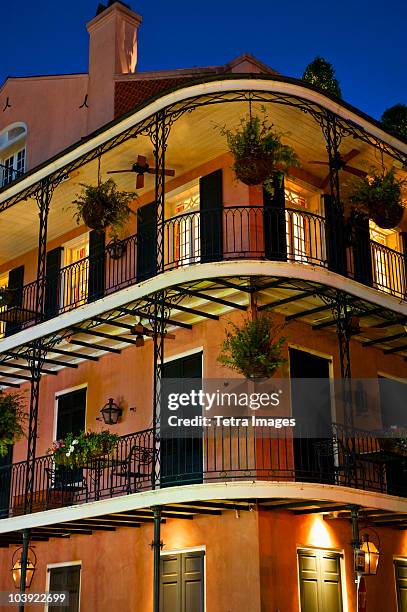 balconies at night in french quarter of new orleans - french quarter stock-fotos und bilder