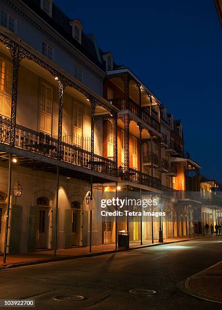 french quarter of new orleans at night - new orleans french quarter stock pictures, royalty-free photos & images