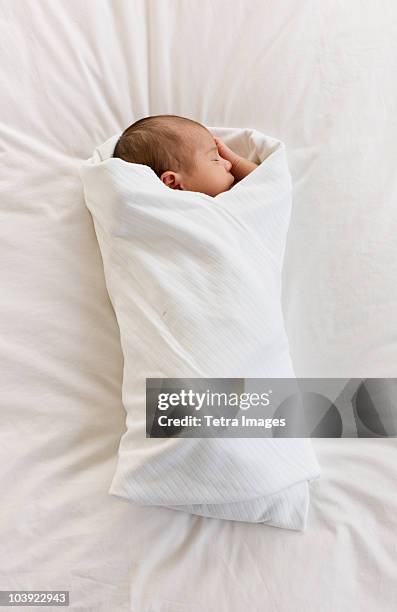 swaddled infant - baby blanket stock pictures, royalty-free photos & images