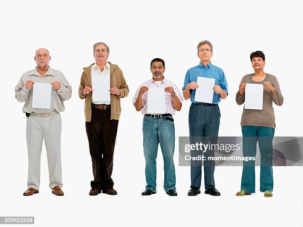 group of people standing in a row holding papers - person holding blank sign fotografías e imágenes de stock