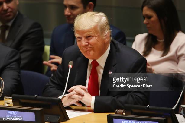 President Donald Trump attends a meeting on the global drug problem at the United Nations with UN Ambassador Nikki Haley a day ahead of the official...