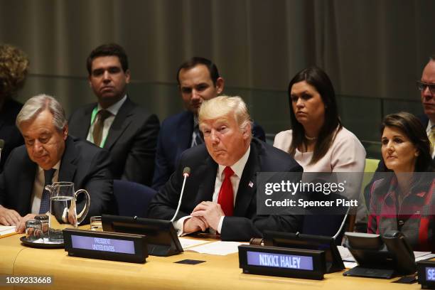 President Donald Trump attends a meeting on the global drug problem at the United Nations with UN Ambassador Nikki Haley a day ahead of the official...
