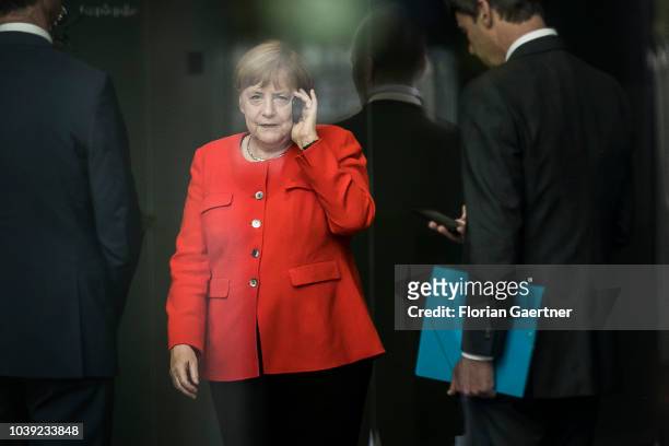German Chancellor Angela Merkel is pictured with during phoning on September 21, 2018 in Berlin, Germany.