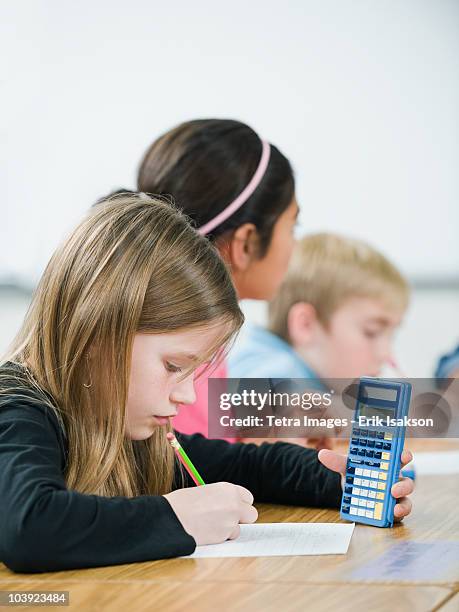 Girl Homework Calculator Photos and Premium High Res Pictures - Getty ...