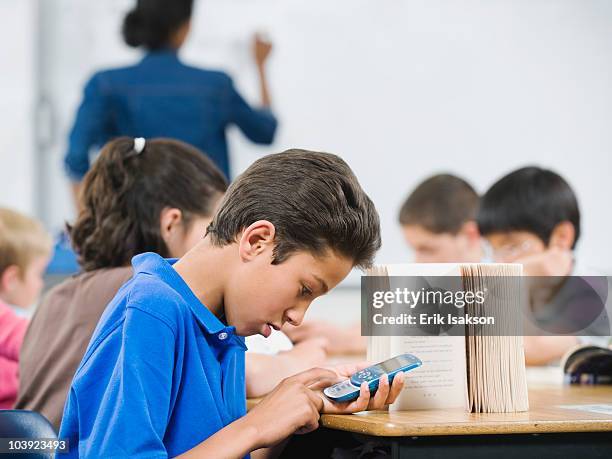 Student Using Multiple Texts Teacher And Texting Student Photos and Premium High Res Pictures ...
